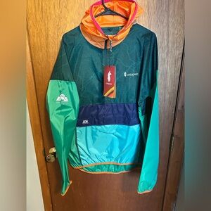 Cotopaxi Teca Half-Zip Windbreaker in Teal and Orange